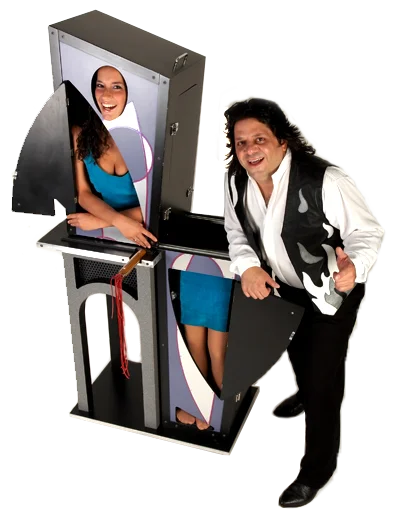 Steve Chezaday performing a grand illusion with his assistant